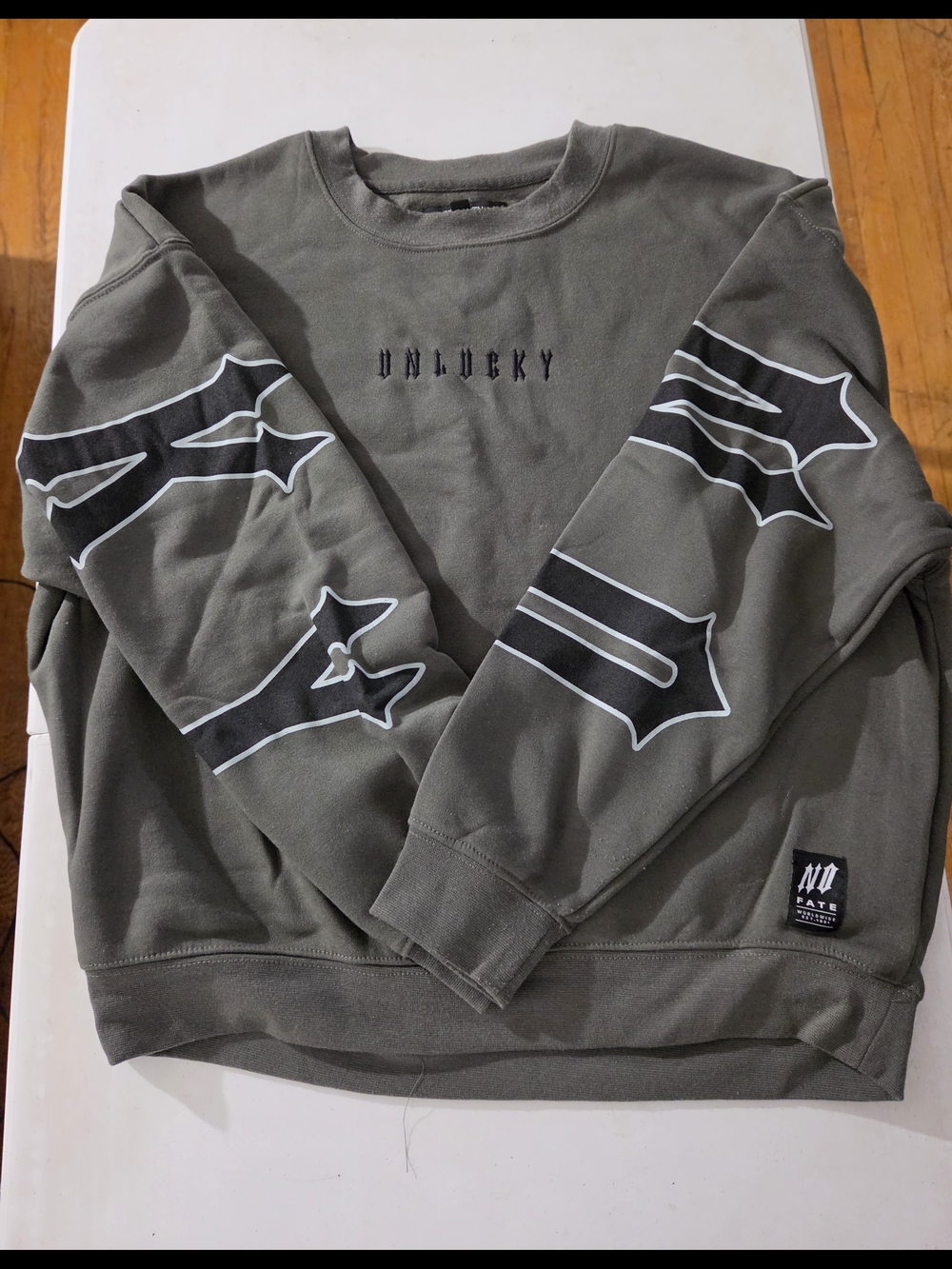 Fashion Nova Olive Green Crewneck Sweatshirt with Black & White Sleeve Graphics